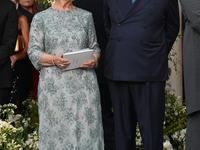 Crown Prince Alexander of Yugoslavia and Crown Princess Katherine of Serbia depart from the Metropolitan Cathedral of Athens after the weddi...