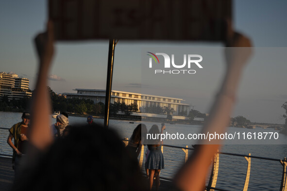 On September 28, 2024, in Washington, DC, a group of 100 protesters gathers at Georgetown Waterfront to protest the war on Palestine in Gaza...