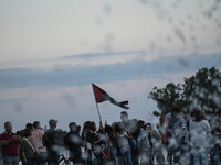 On September 28, 2024, in Washington, DC, a group of 100 protesters gathers at Georgetown Waterfront to protest the war on Palestine in Gaza...