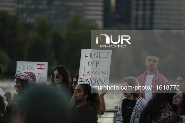 On September 28, 2024, in Washington, DC, a group of 100 protesters gathers at Georgetown Waterfront to protest the war on Palestine in Gaza...