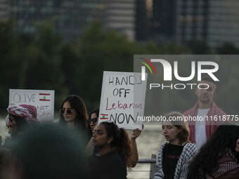 On September 28, 2024, in Washington, DC, a group of 100 protesters gathers at Georgetown Waterfront to protest the war on Palestine in Gaza...