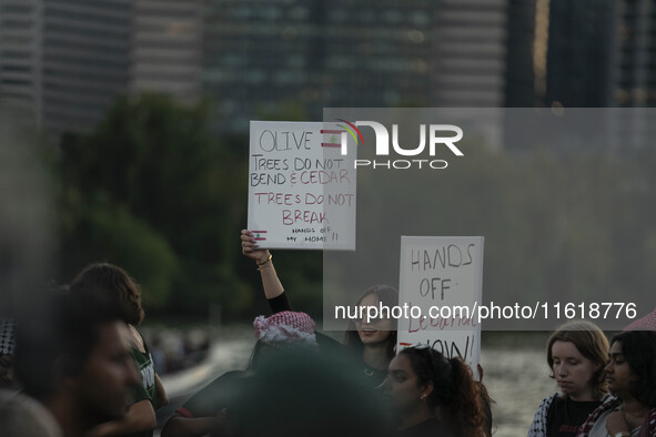 On September 28, 2024, in Washington, DC, a group of 100 protesters gathers at Georgetown Waterfront to protest the war on Palestine in Gaza...