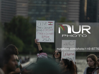 On September 28, 2024, in Washington, DC, a group of 100 protesters gathers at Georgetown Waterfront to protest the war on Palestine in Gaza...