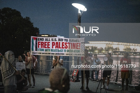 On September 28, 2024, in Washington, DC, a group of 100 protesters gathers at Georgetown Waterfront to protest the war on Palestine in Gaza...