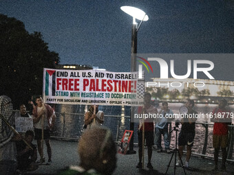 On September 28, 2024, in Washington, DC, a group of 100 protesters gathers at Georgetown Waterfront to protest the war on Palestine in Gaza...