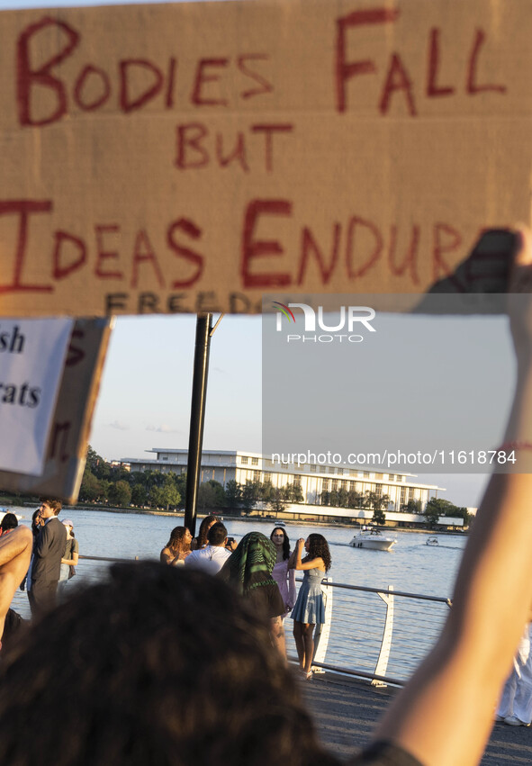 On September 28, 2024, in Washington, DC, a group of 100 protesters gathers at Georgetown Waterfront to protest the war on Palestine in Gaza...