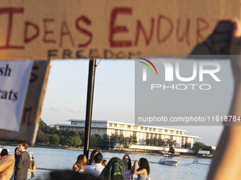 On September 28, 2024, in Washington, DC, a group of 100 protesters gathers at Georgetown Waterfront to protest the war on Palestine in Gaza...