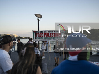 On September 28, 2024, in Washington, DC, a group of 100 protesters gathers at Georgetown Waterfront to protest the war on Palestine in Gaza...