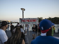 On September 28, 2024, in Washington, DC, a group of 100 protesters gathers at Georgetown Waterfront to protest the war on Palestine in Gaza...