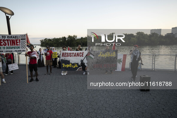 On September 28, 2024, in Washington, DC, a group of 100 protesters gathers at Georgetown Waterfront to protest the war on Palestine in Gaza...