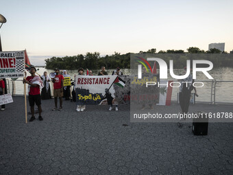 On September 28, 2024, in Washington, DC, a group of 100 protesters gathers at Georgetown Waterfront to protest the war on Palestine in Gaza...