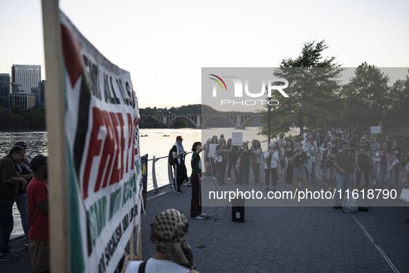 On September 28, 2024, in Washington, DC, a group of 100 protesters gathers at Georgetown Waterfront to protest the war on Palestine in Gaza...