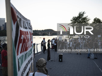 On September 28, 2024, in Washington, DC, a group of 100 protesters gathers at Georgetown Waterfront to protest the war on Palestine in Gaza...