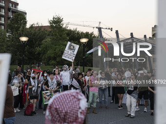 On September 28, 2024, in Washington, DC, a group of 100 protesters gathers at Georgetown Waterfront to protest the war on Palestine in Gaza...