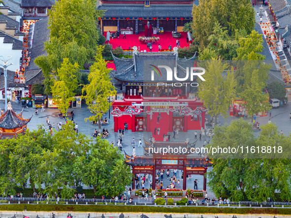 Tourists visit the Confucius Temple scenic spot in Nanjing, China, on September 28, 2024. 