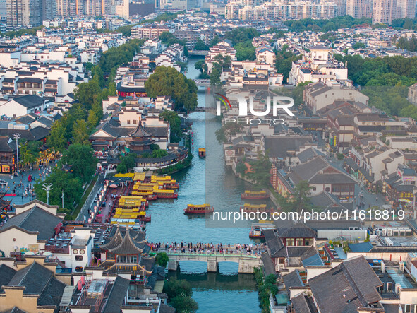 Tourists visit the Confucius Temple scenic spot in Nanjing, China, on September 28, 2024. 