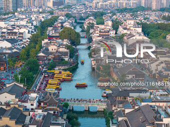 Tourists visit the Confucius Temple scenic spot in Nanjing, China, on September 28, 2024. (