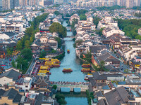 Tourists visit the Confucius Temple scenic spot in Nanjing, China, on September 28, 2024. (