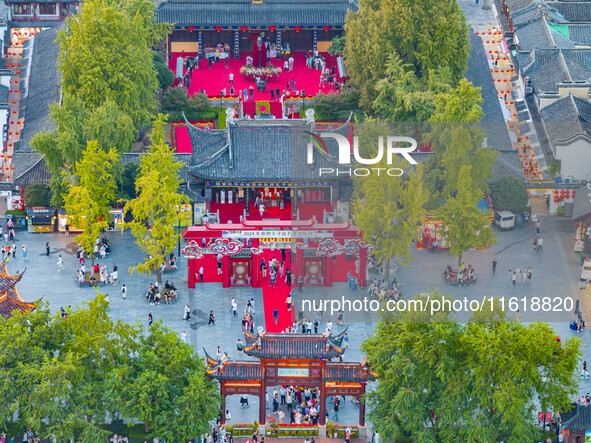 Tourists visit the Confucius Temple scenic spot in Nanjing, China, on September 28, 2024. 