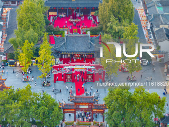 Tourists visit the Confucius Temple scenic spot in Nanjing, China, on September 28, 2024. (