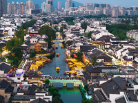 Tourists visit the Confucius Temple scenic spot in Nanjing, China, on September 28, 2024. (