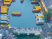 Tourists visit the Confucius Temple scenic spot in Nanjing, China, on September 28, 2024. (