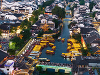 Tourists visit the Confucius Temple scenic spot in Nanjing, China, on September 28, 2024. (