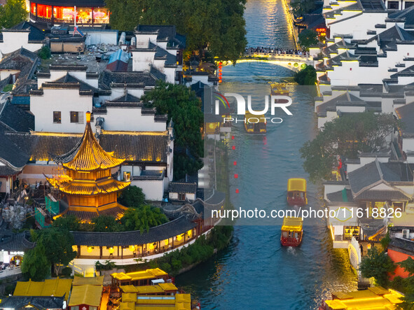 Tourists visit the Confucius Temple scenic spot in Nanjing, China, on September 28, 2024. 