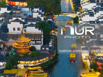 Tourists visit the Confucius Temple scenic spot in Nanjing, China, on September 28, 2024. (