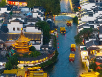 Tourists visit the Confucius Temple scenic spot in Nanjing, China, on September 28, 2024. (