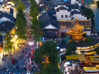 Tourists visit the Confucius Temple scenic spot in Nanjing, China, on September 28, 2024. (