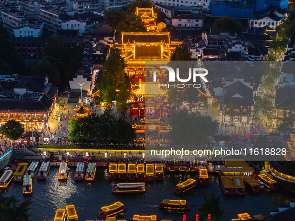 Tourists visit the Confucius Temple scenic spot in Nanjing, China, on September 28, 2024. 