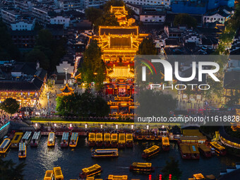 Tourists visit the Confucius Temple scenic spot in Nanjing, China, on September 28, 2024. (