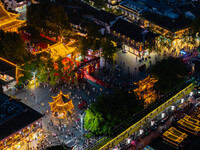 Tourists visit the Confucius Temple scenic spot in Nanjing, China, on September 28, 2024. (