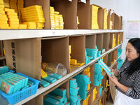 A worker works in a workshop of a fishing tackle company in Binzhou, China, on September 29, 2024. (