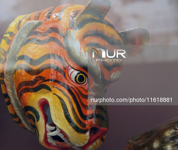 Tibetan opera masks are displayed at the Tibetan Sho Dun Festival at the Tibet Museum in Lhasa, Tibet, China, on August 8, 2024. 