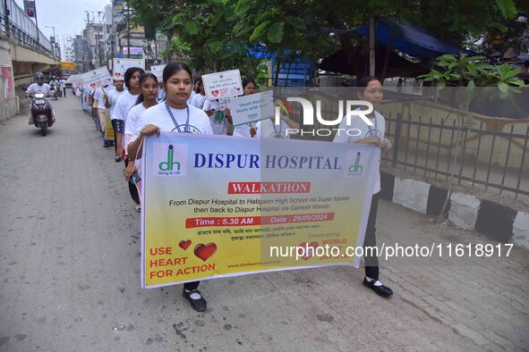 Students participate during World Heart Day rally in Guwahati, India, on September 29, 2024. 