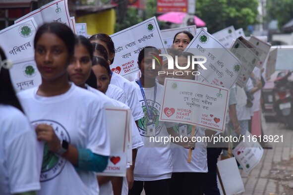 Students participate during World Heart Day rally in Guwahati, India, on September 29, 2024. 