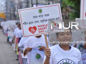 Students participate during World Heart Day rally in Guwahati, India, on September 29, 2024. (