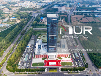 A photo taken on September 27, 2024, shows the office building of Shuanghui headquarters in Luohe, China, on September 27, 2024. (