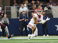 Arkansas Razorbacks Wide Receiver Isaiah Sategna #6 catches the ball against Texas A&M Razorbacks during the Southwest Classic match between...