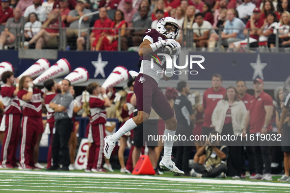 Texas A&M Aggies wide receiver Noah Thomas #3 catches the ball against the Arkansas Razorbacks during the Southwest Classic match between th...