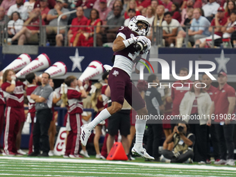 Texas A&M Aggies wide receiver Noah Thomas #3 catches the ball against the Arkansas Razorbacks during the Southwest Classic match between th...