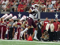 Texas A&M Aggies wide receiver Noah Thomas #3 catches the ball against the Arkansas Razorbacks during the Southwest Classic match between th...