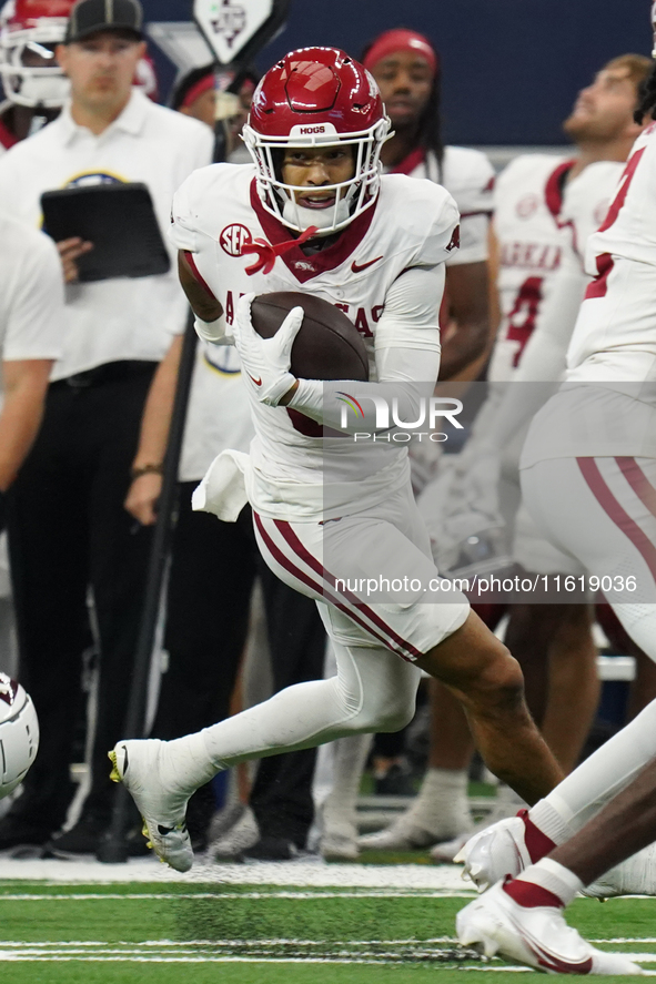 Arkansas Razorbacks Wide Receiver Isaiah Sategna #6 catches the ball against Texas A&M Razorbacks during the Southwest Classic match between...