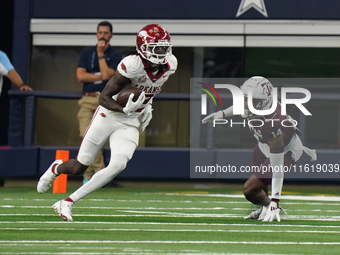 Arkansas Razorbacks wide receiver Andrew Armstrong #2 runs the ball against Texas A&M during the Southwest Classic match between the Arkansa...