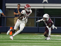 Arkansas Razorbacks wide receiver Andrew Armstrong #2 runs the ball against Texas A&M during the Southwest Classic match between the Arkansa...