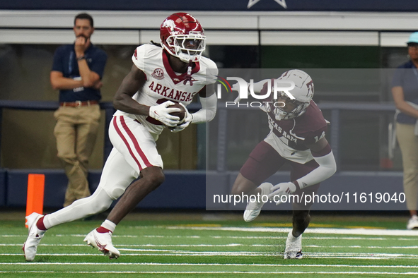 Arkansas Razorbacks wide receiver Andrew Armstrong #2 runs the ball against Texas A&M during the Southwest Classic match between the Arkansa...