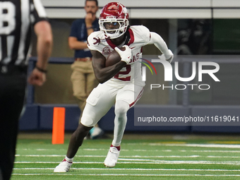 Arkansas Razorbacks wide receiver Andrew Armstrong #2 runs the ball against Texas A&M during the Southwest Classic match between the Arkansa...