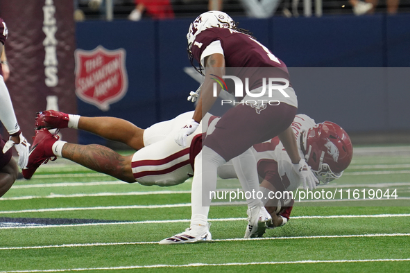 Arkansas Razorbacks running back Ja'Quinden Jackson #22 catches the ball against Texas A&M Aggies during the Southwest Classic match between...